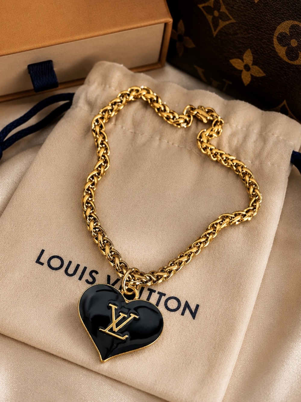 Gold Chain bracelet with Black Heart LV Pendant